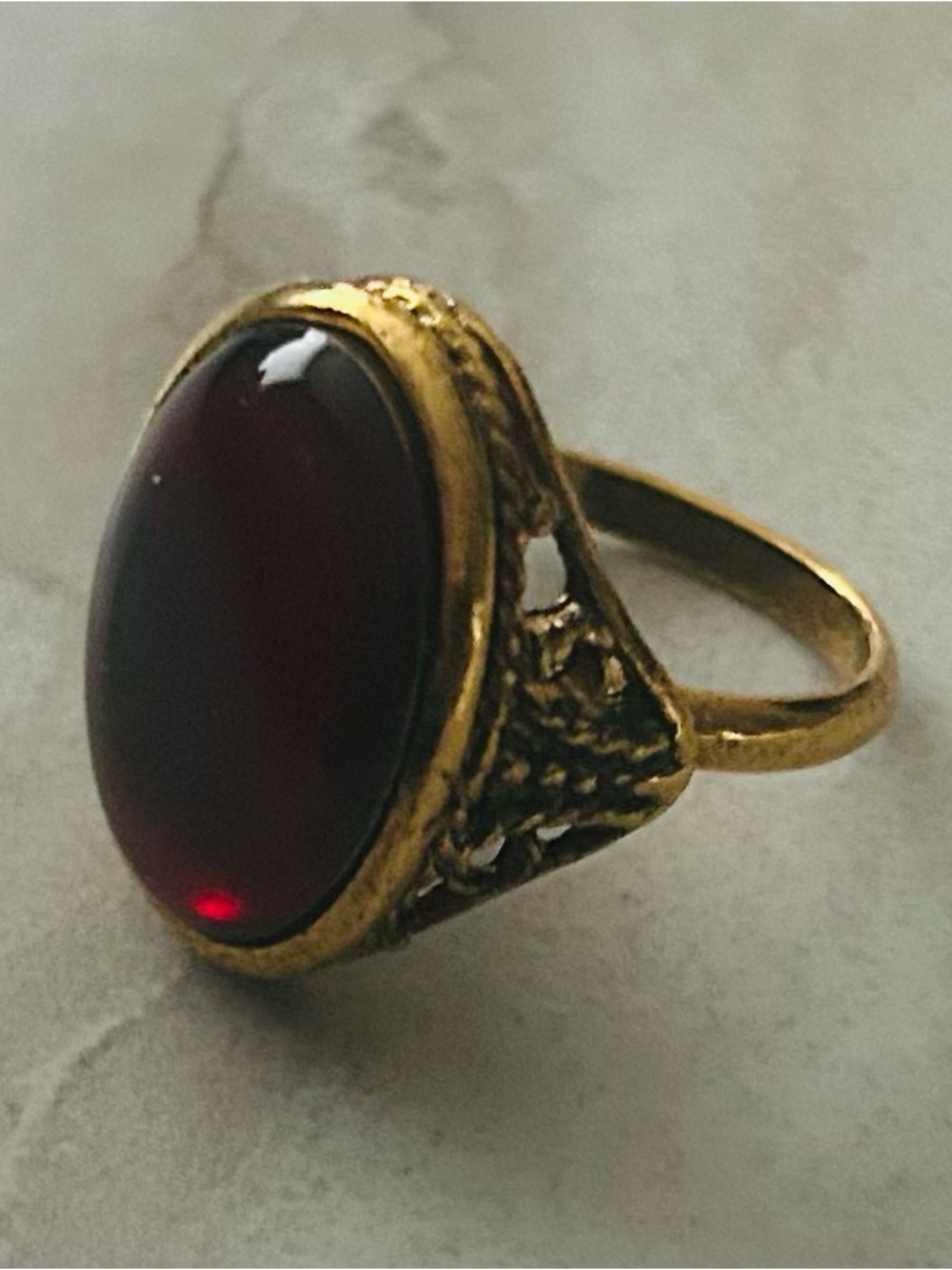 Ornate Vintage Gold Toned Ring with Deep Red Cabochon